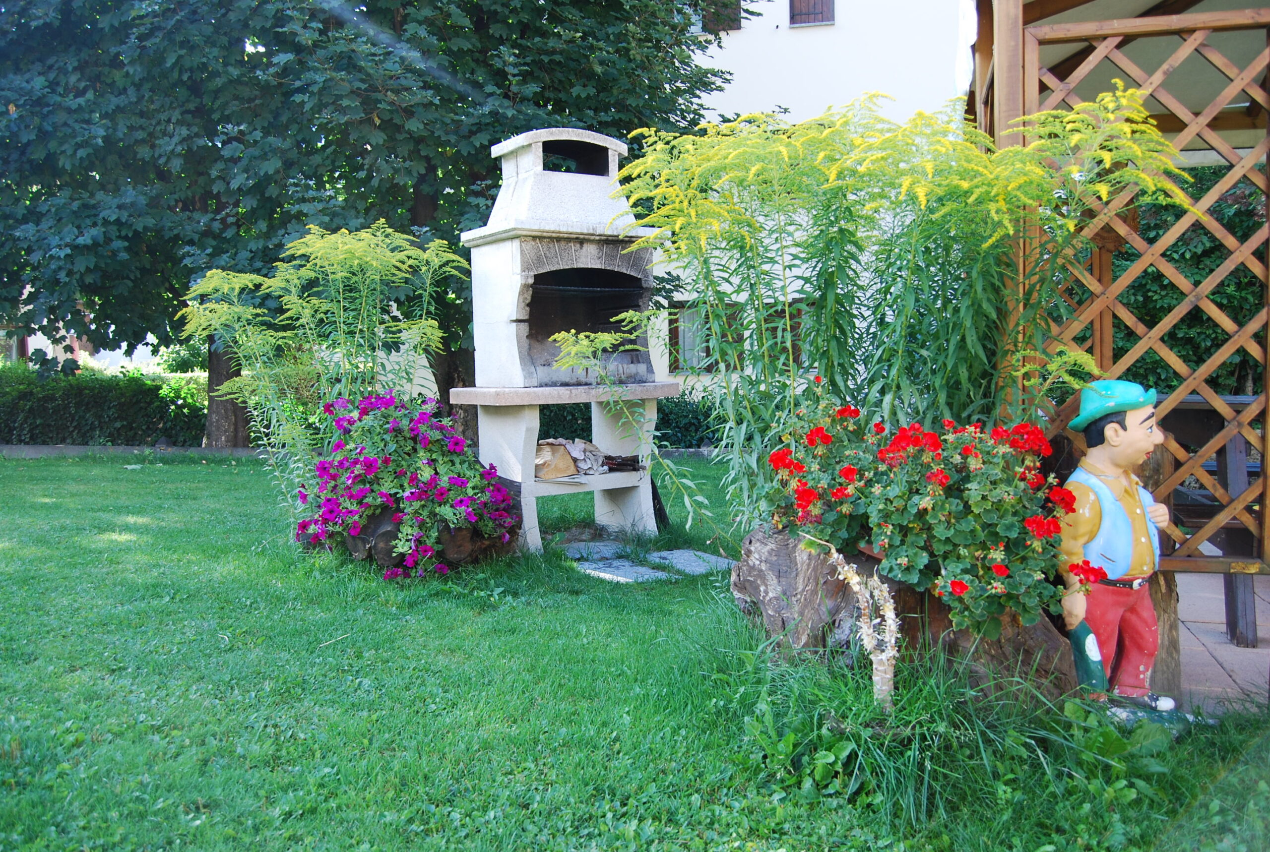 Chalet con giardino e barbecue